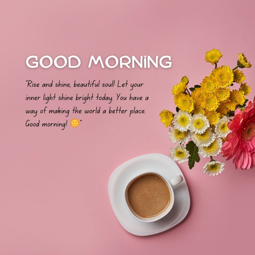 A motivational "good morning" message for friends with text alongside a cup of coffee and a vibrant bouquet of yellow and pink flowers against a soft pink background.