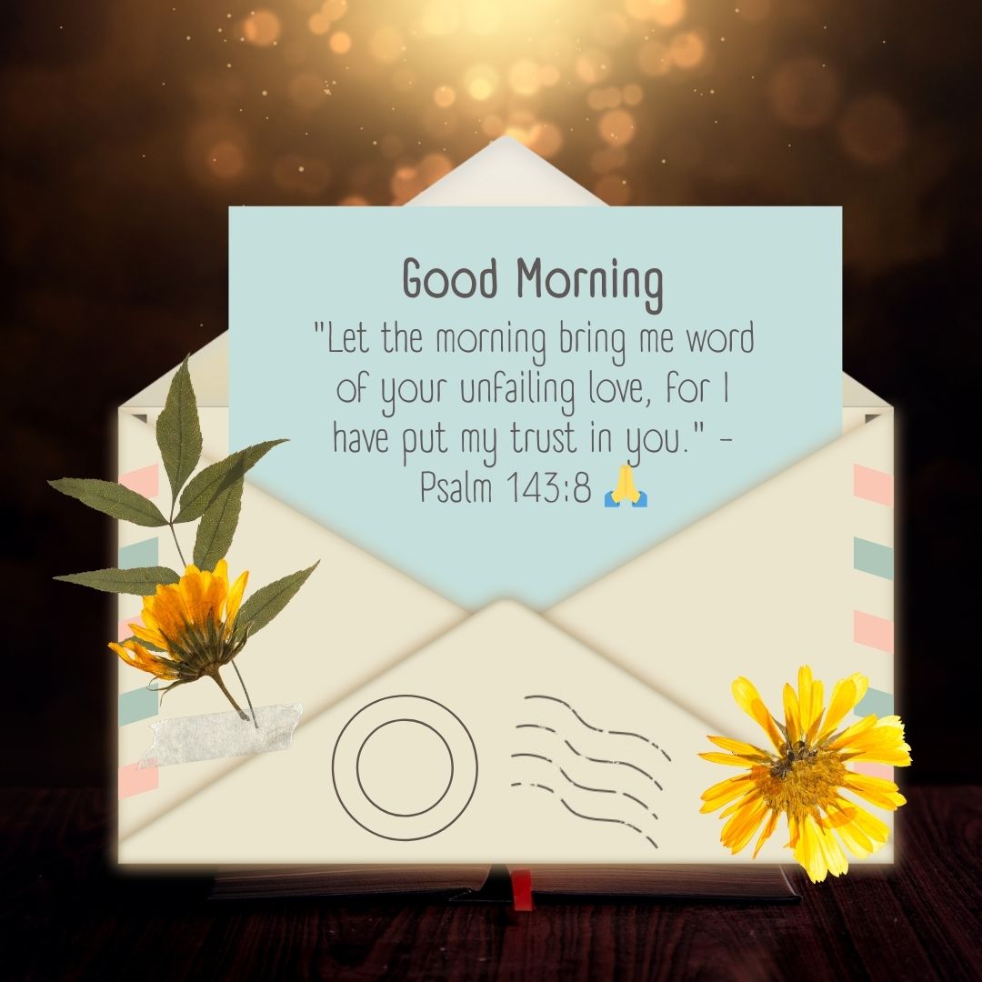 An open envelope displays a card with a "Good Morning" greeting and a Bible verse from Psalm 143:8, surrounded by a decorative design and flowers, set against a softly lit wooden background.