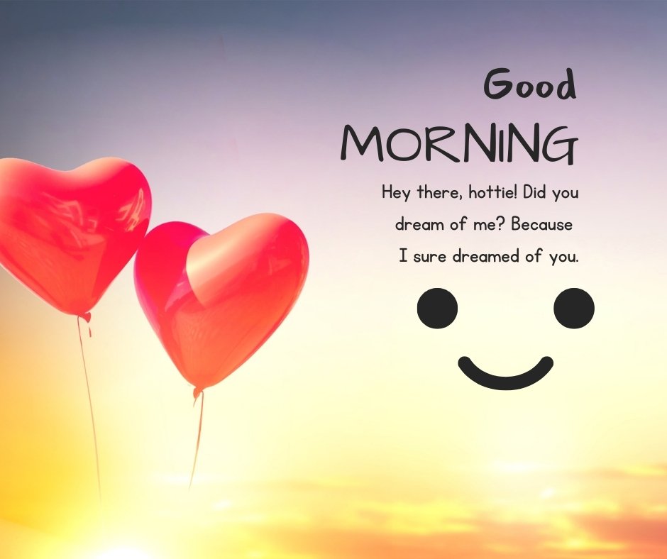 Flirty Good Morning Messages For Her & Him featuring two red heart-shaped balloons against a vibrant sunrise background. The playful message reads: "Good Morning. Hey there, hottie! Did you dream of me? Because I sure dreamed of you."