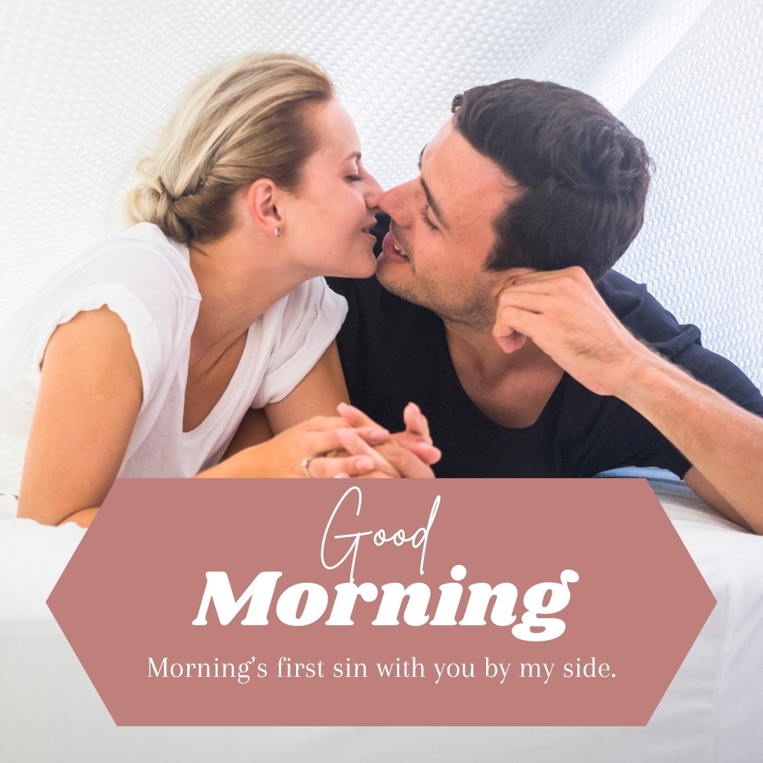 Good Morning Kiss Image featuring a couple sharing an intimate kiss in bed, with the romantic text 'Morning's first sin with you by my side' in a cozy, bright bedroom setting.