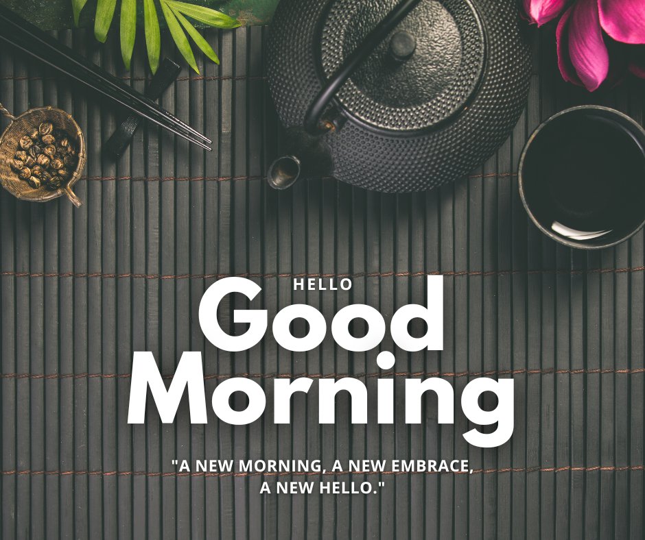 Good morning tea image showcasing an elegant black teapot, a cup of tea, and tea leaves on a matching tray, beautifully arranged on a dark bamboo mat with vivid pink flowers and green leaves adding a pop of color.