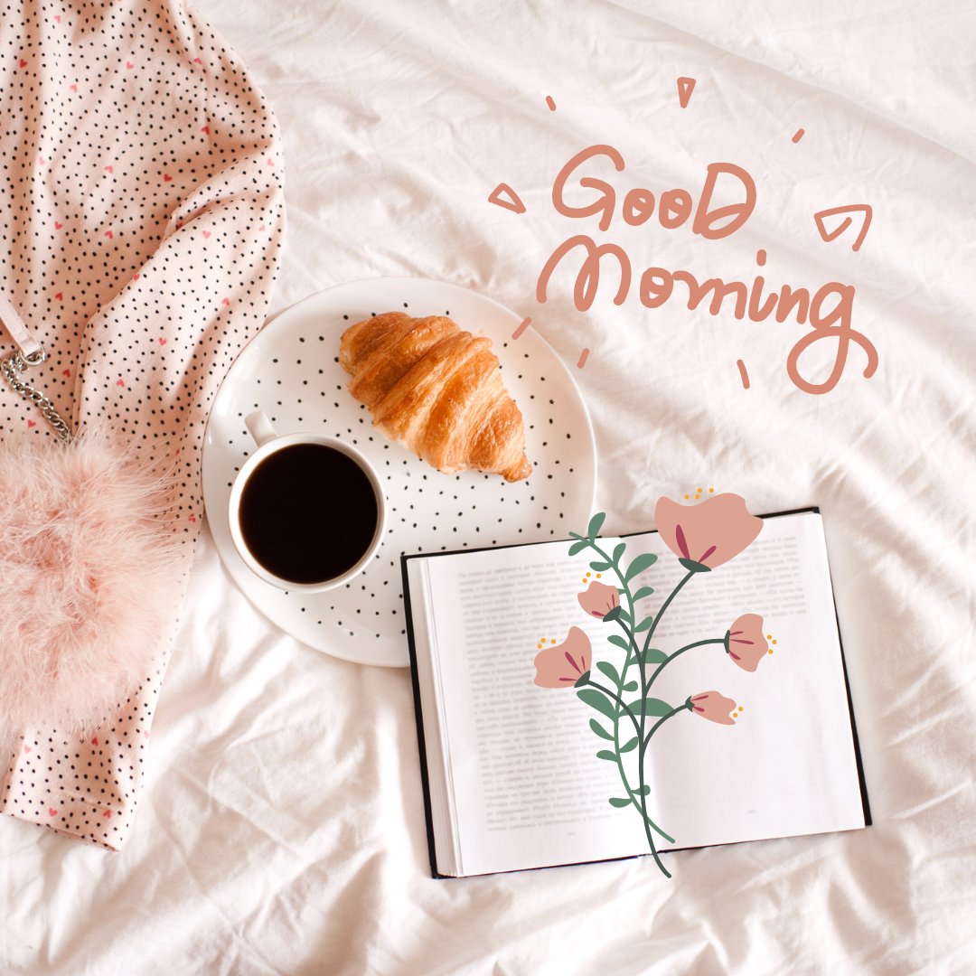 Cozy good morning scene with a freshly brewed cup of black coffee, a buttery croissant on a polka dot plate, and an open book surrounded by soft pink accents and a 'Good Morning' greeting.